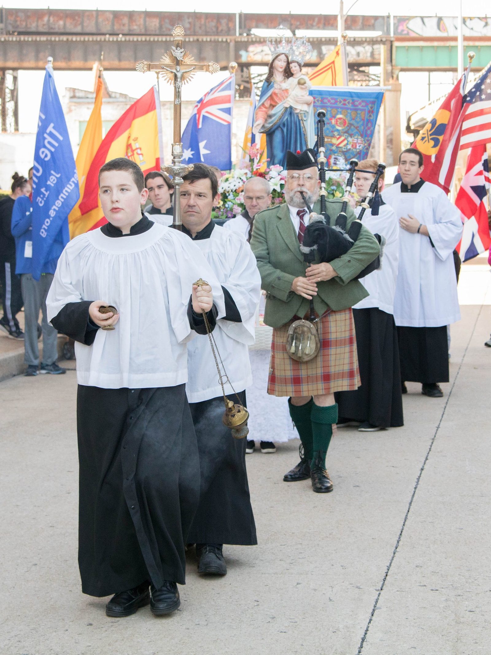 Bagpiper Leads the Procession — Rosary Run